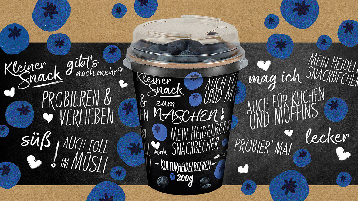 Die Designidee von L&S zeigt eine Verpackung für Heidelbeeren aus einem bedruckten Pappbecher mit durchsichtigen Kunststoff-Deckel.