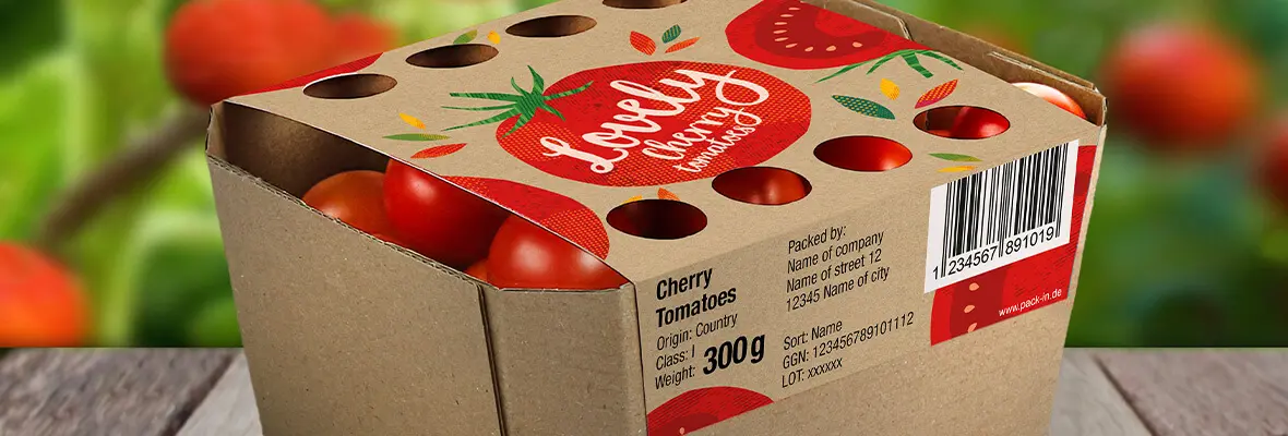Nahaufnahme einer Kartonverpackung mit Cherrytomaten.